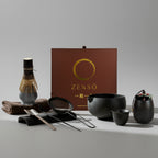Matcha set with Zensó branding against a windowed wall.